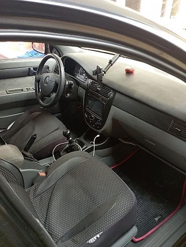 daf ati 400: Daewoo Gentra: 1.5 l | 2013 il Sedan — 10