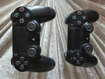 ps4 slim disk: Ps 4 slim 1 tr.tam ela veziyyetde,iki arijinal pult.prasifkali icinde — 2