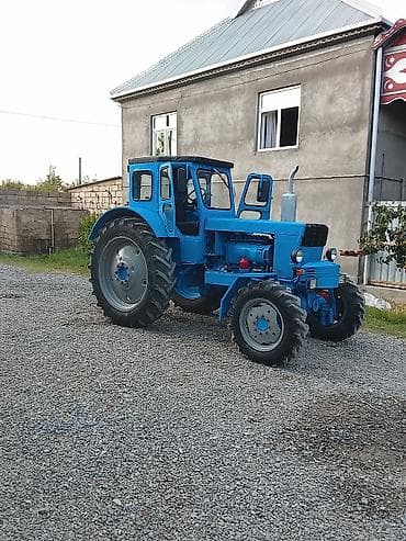 vaz 2107 abilsofka: Mavi rəngli təkərli kənd təsərrüfatı traktoru. Xüsusiyyətlər: - Ön və — 1