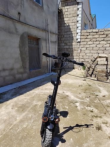 Elektrik skuter – off-road tipli, iri dişli təkərlər və güclü asqı — 3