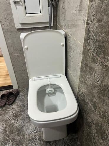 unitaz qiymətləri: Ağ rəngdə unitaz, standart ölçülərə malikdir və hər bir müasir vanna — 1