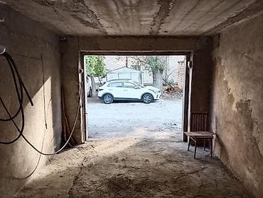 9cu mikrorayon: 9-cu Mikrorayonda, yol kənarında yerləşən daş qaraj icarəyə verilir — 2