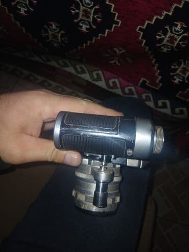 Fotokameralar: Məhsul: Sovet istehsalı 8 mm lentli kino-kamera Təsvir: - Mexaniki — 6