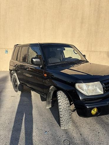 04 maşınlar: Mitsubishi Pajero: 1.8 l | 2000 il 394000 km Ofrouder/SUV — 1