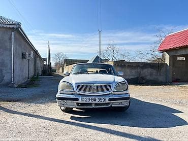 opel zafira a: QAZ 31105 Volga: 2.3 l | 2004 il 350350 km Sedan — 1