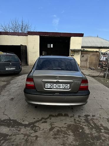maşın 06: Opel Vectra B sedan - Gümüşü rəng, 4 qapı, arxa işıqlar və krom — 2