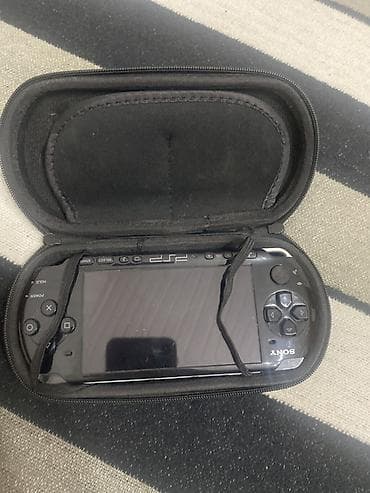 psp 2000: Ekranı təmizdir, cızıq yoxdur. Batareyası və adapteri olmadığı üçün — 8