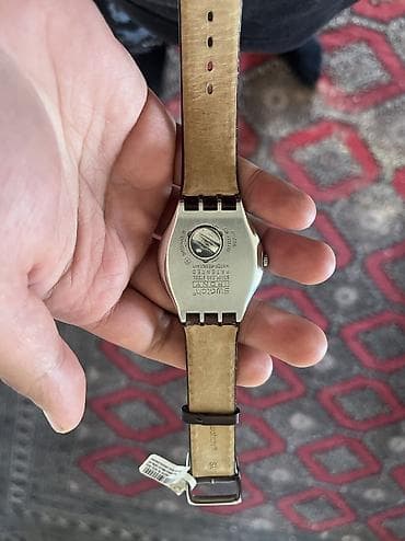 saat vitirni: Tecili satilir swatch orjinal ol Saati teze istifade olunmayib — 2