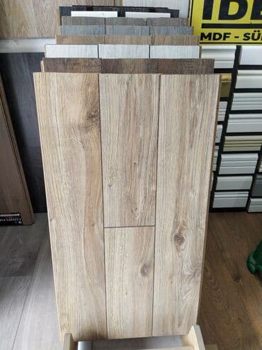 Ağac effektli laminat döşəmə nümunələri. Bu laminat döşəmə, evinizə və