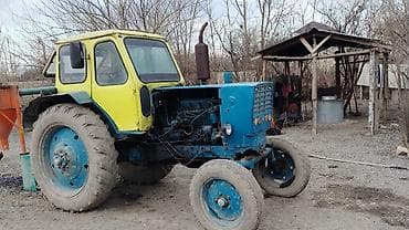 yem qiran: Traktor və qoşulan aqreqat - Təsərrüfat işləri üçün universal təkərli — 2