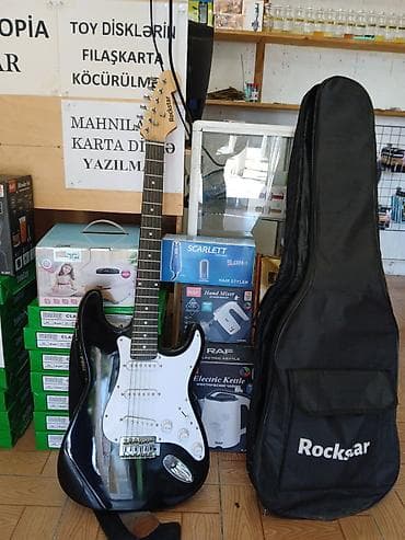 Elektron gitara, İşlənmiş, Ünvandan götürmə