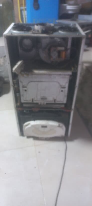 Швейные машины: Б/у Комби Ariston 24 кВт — 2