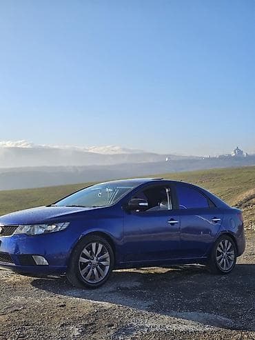 Kia Cerato: 2 l | 2009 il Sedan