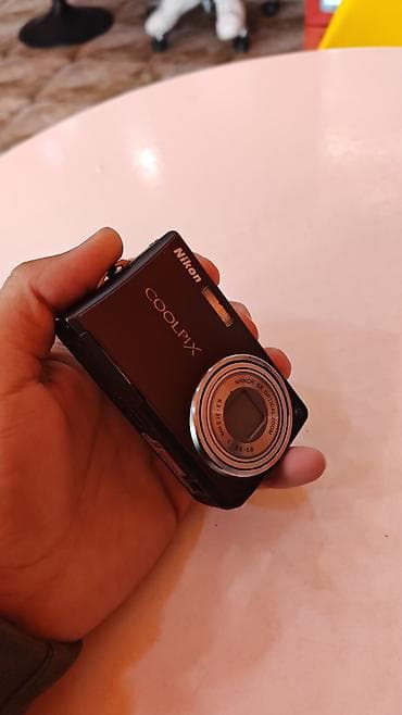 ucuz macbook pro: Nikon COOLPIX rəqəmsal fotoaparat - Kompakt cib ölçüsü, yüngül gövdə — 1