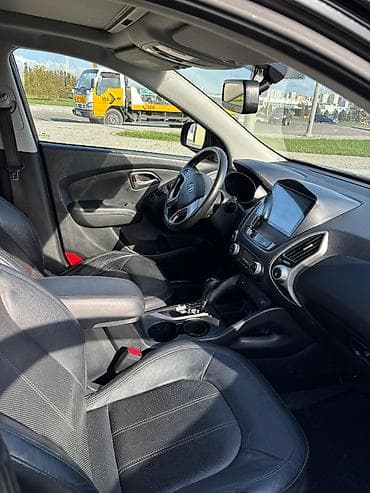 Hyundai Tucson: 0.2 l | 2009 il Krossover — 8