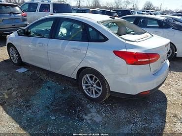 şevralit avtomobil: Ford Focus sedan, ağ rəng. - Kuzov: 4 qapılı sedan, aerodinamik qabaq — 8