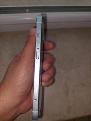 kohne paltaryuyan aliram: IPhone 15, Ağ, Face ID — 3