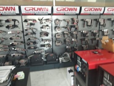dəzgah drel: Crown markalı müxtəlif elektrik alətləri nümayiş olunur. Burada — 2