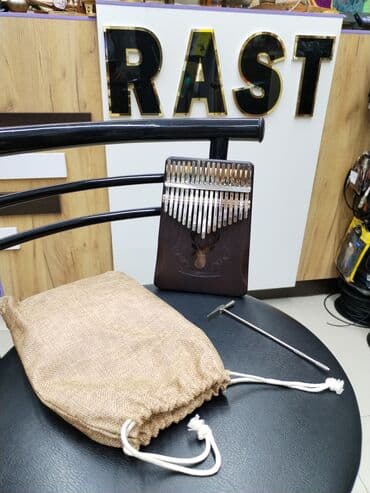 dominos sumqayit: Kalimba musiqi aləti Rast musiqi alətləri mağazalar şəbəkəsi 3 ünvanda — 1