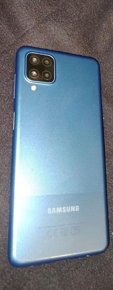 Samsung Galaxy A12, 32 ГБ, цвет - Голубой, Отпечаток пальца