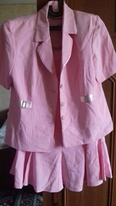 Qadin kostumu dvoykadir cox gozal cahrayi ranqdadir bir dafa geyilib lalafo.az -da Qadin kostumu dvoykadir cox gozal cahrayi ranqdadir bir dafa geyilib