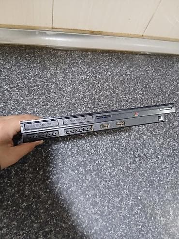 kabura iphone x: Sony PlayStation 2 Slim konsolu Model: SCPH-90004 (PAL) Güc girişi — 3