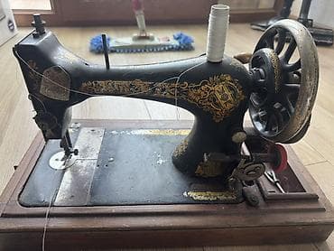 Kitablar və jurnallar: Məhsul: Singer mexaniki tikiş maşını (antik model) Xüsusiyyətlər: - — 4