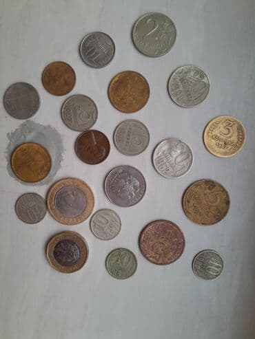 Kəsici disklər: Kolleksiya üçün müxtəlif ölkə və illərə aid metal sikkələr dəsti — 1