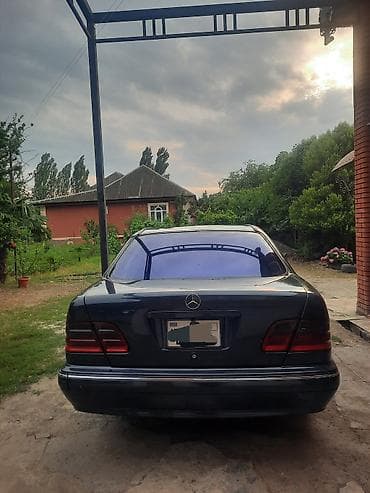 vaz 2107 lider disk teker satisi: Mercedes-Benz E‑Class (W210) sedan - Kuzov: 4 qapılı sedan, tünd mavi — 2