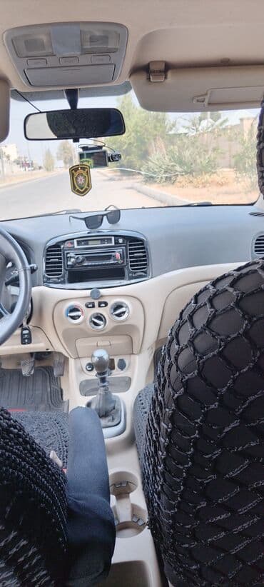 hundai disk: Hyundai Accent: 1.4 l | Sedan — 11