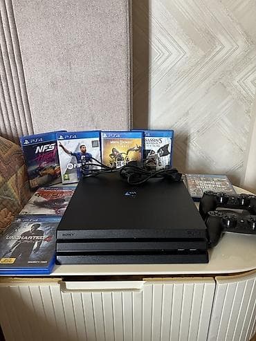 PlayStation 4 Pro komplekti - Konsol: Sony PlayStation 4 Pro (qara)