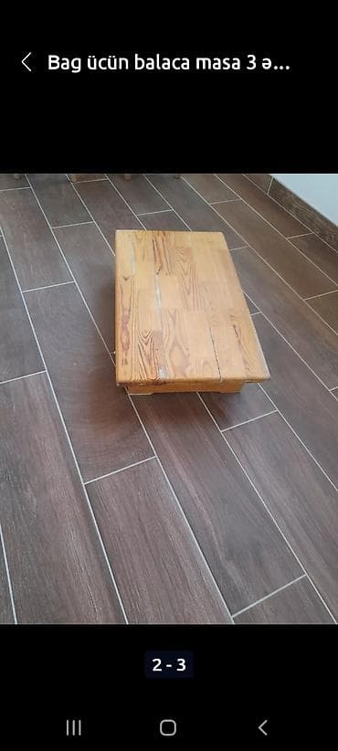 Balaca masalar satılır yerdə əyləşib qarşında masa kimin isdifadə