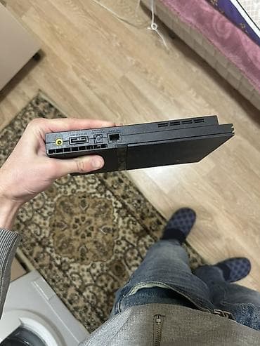 tv kransteyn: Sony PlayStation 2 Slim (PS2 Slim) oyun konsolu endirim olacag — 1