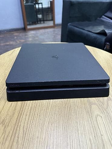 irsad playstation 4: Ps 4 slim satılır. Yaddaşı 1 TB Üzərində bir ədəd orginal pultu var — 5