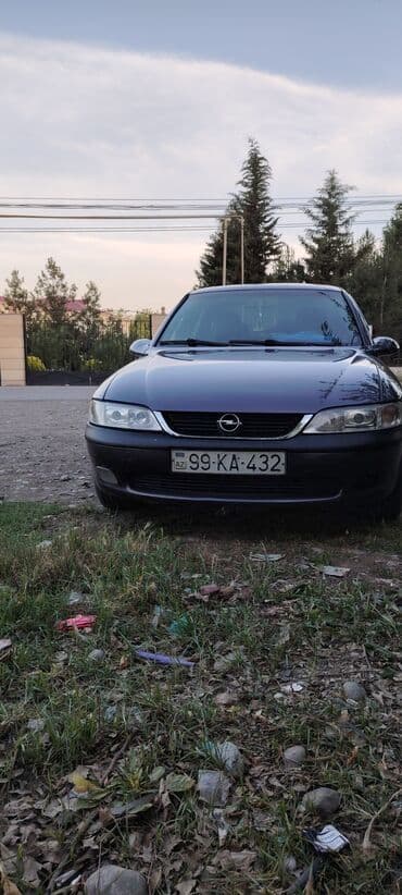 запчасти на опель вектра: Tünd göy rəngdə olan Opel Vectra sedanı. Bu avtomobil rahat və — 2