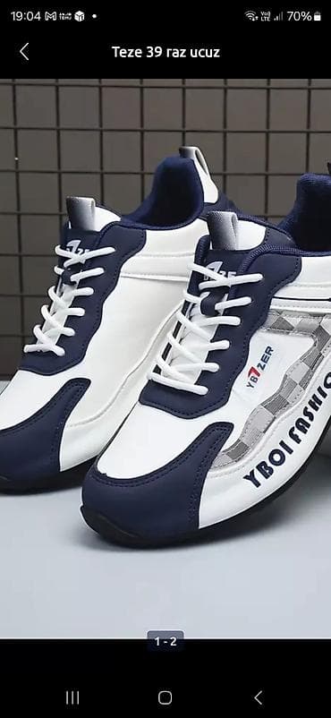 Botinkalar: Məhsul: Krossovka (YBOI FASHION yazılı) Ölçü: 39 Rəng: Ağ–tünd göy — 1