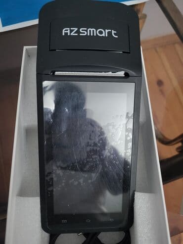 az smart kassa aparatı: AZSmart brendinə məxsus bu qara rəngli, portativ POS terminalı biznes — 1