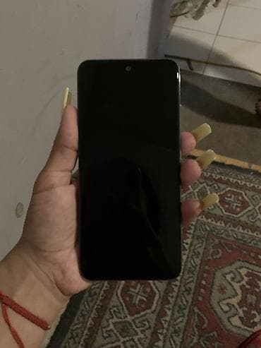inter: Redmi smartfon - Model: Redmi Note 10 (şəkildəki arxa modul dizaynı — 1