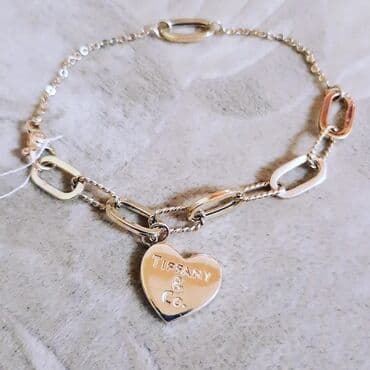 tək qaş: Bilərzik, Tiffany, Sarı qızıl, 585 Əyar, 803 g — 2