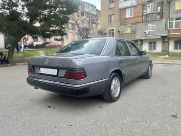 nolyeddi sekilleri yukle: Mercedes-Benz E 230: 2.3 l | 1992 il Sedan — 7