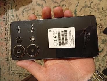 redmi not 13 pro qiyməti: Redmi smartfon - Model: Redmi (arxa korpusda “Redmi” loqosu). - Arxa — 2