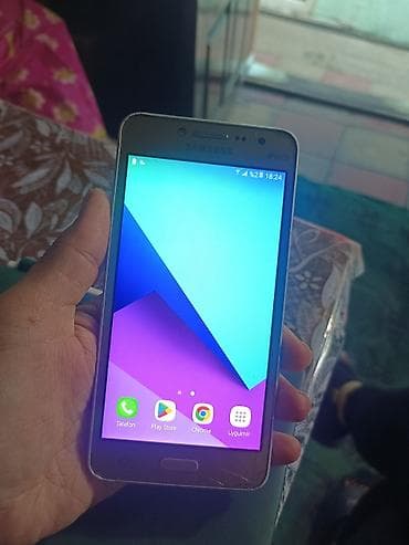 philips xenium 9@9s: Samsung Galaxy J2 Prime — 1