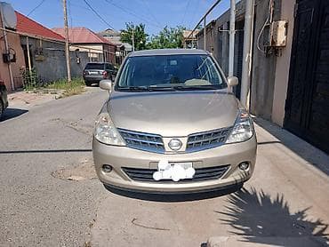 diskiler: Nissan Tiida hatchback - Kuzov: 5 qapılı hatchback, qızılı/şampan — 1