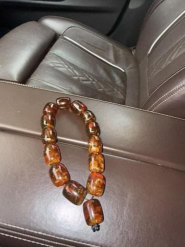 Zərgərlik əşyaları: Qəhvəyi-kəhrəba rəng çalarlarında böyük formalı muncuqlardan ibarət — 4