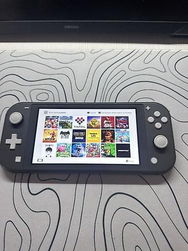 nini: Satılır: Nintendo Switch Lite (İdeal vəziyyətdə) Nintendo Switch Lite — 2