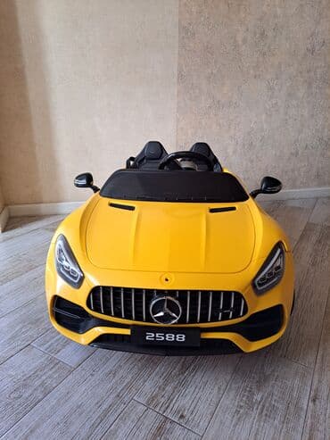 детский мотоцикл каталка: Uşaq üçün elektrikli ride-on avtomobil – sarı rəngdə sport kabriolet — 4