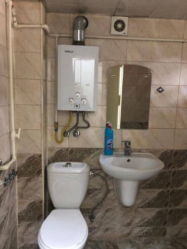 1 комнатная квартира снять: Nizami rayonu,Q Qarayev Metrosu çıxışındakı bina.5 mərtəbəli — 9