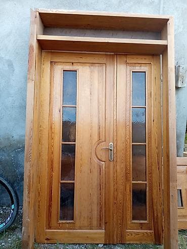 islenmis plastik qapi satilir: Məhsul: Təbii ağac giriş qapıları (şüşəli) Təsvir: - Material — 1