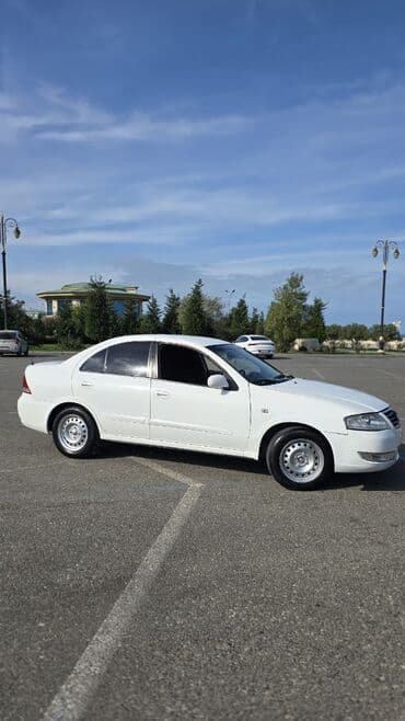 опель зафира а: Nissan Almera Classic: 1 l | 2007 il Sedan — 9