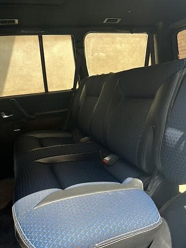 arxa panel: Mitsubishi Pajero: 2.8 l | 1995 il Ofrouder/SUV — 4
